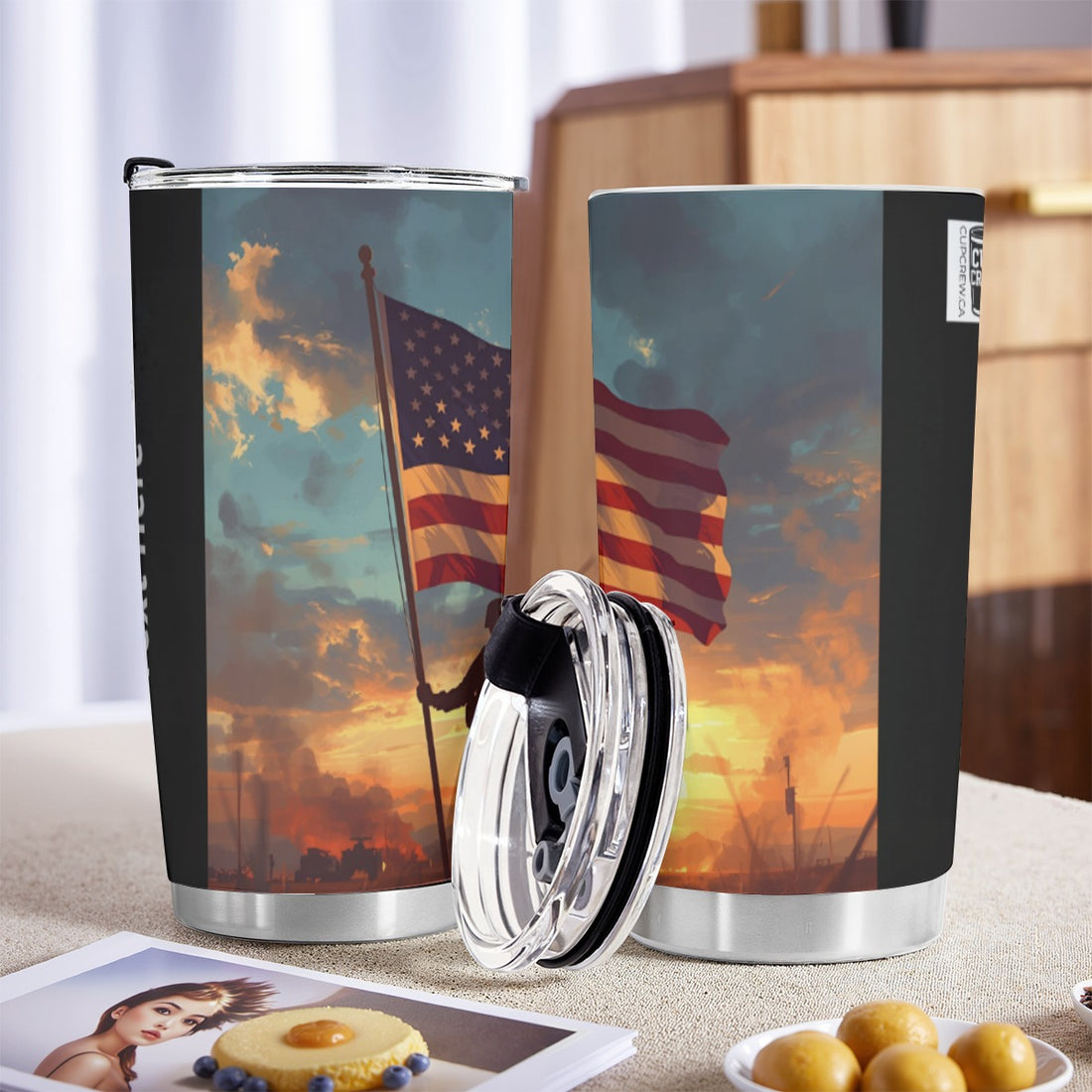 A silhouetted figure stands holding an American flag against a backdrop of a vibrant sunset sky.