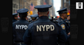 A group of police officers in uniform, with the name 